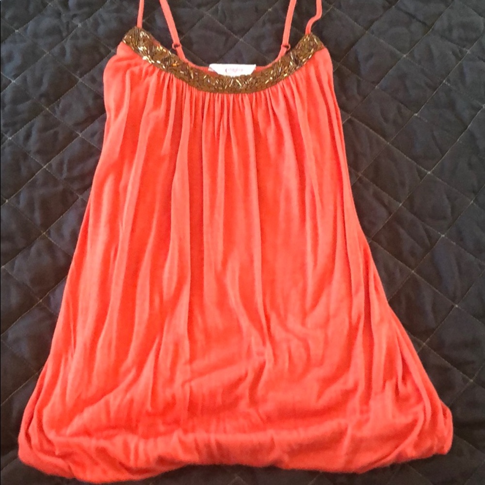 Tank with gold detail